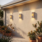 Compact Yellow Travertine Up Down Outdoor Wall Light in a pair either side of an entry door