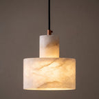 Copper and Alabaster Cylinder Pendant Light close view of the glowing veined alabaster and copper ring