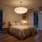 Cream Fabric Wabi Sabi Pendant Light centred above a bed