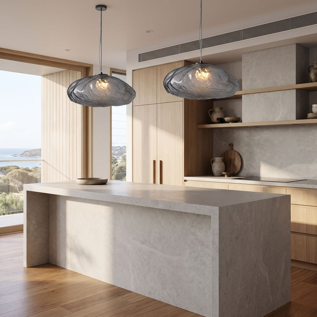 Crumpled Glass Cloud Pendant Light in a pair over a stone kitchen island