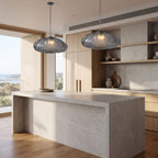 Crumpled Glass Cloud Pendant Light in a pair over a stone kitchen island