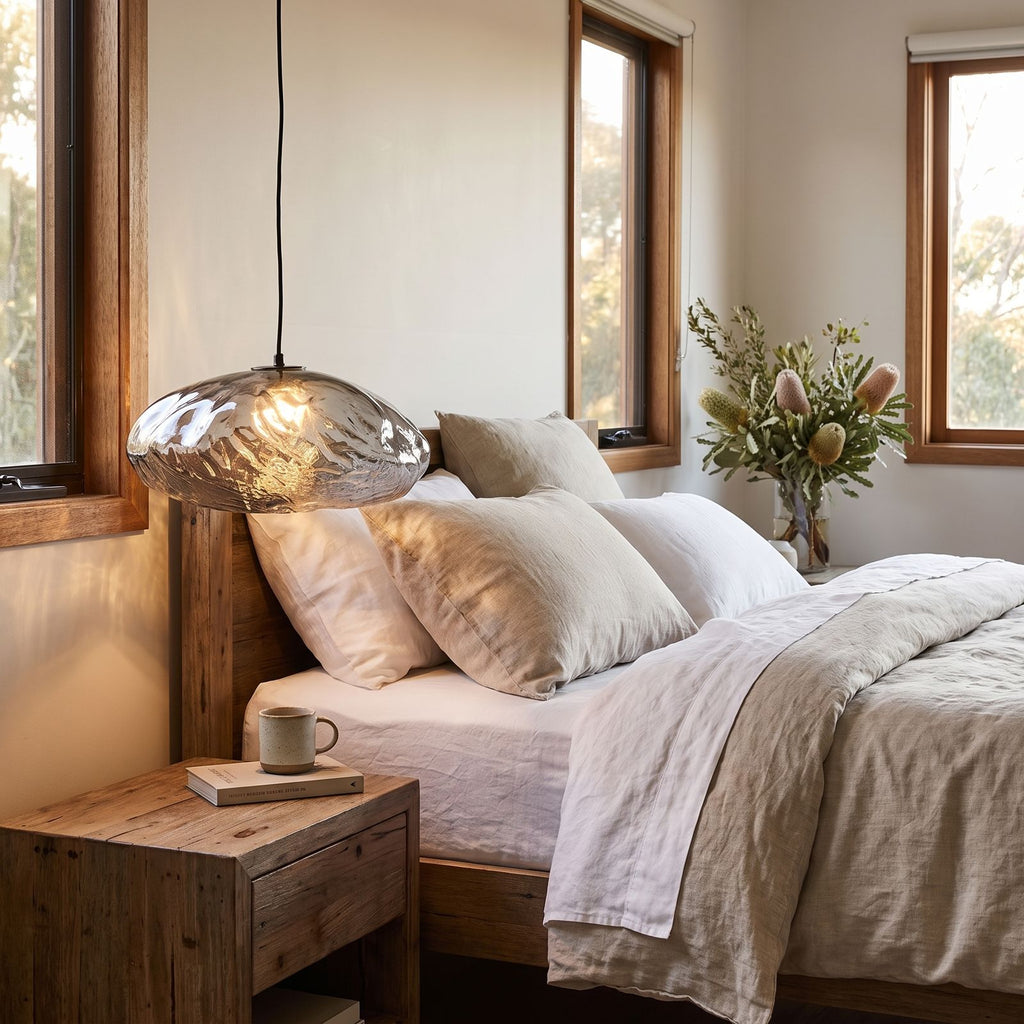 Crumpled Glass Cloud Pendant Light beside a bed as a bedside pendant