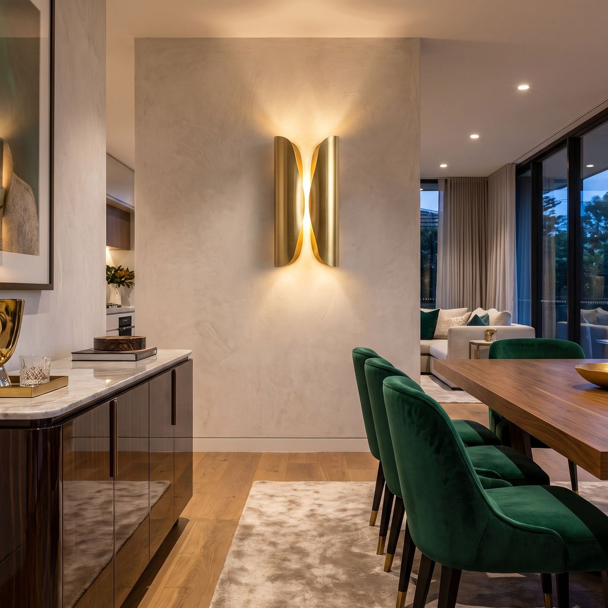 Curled Brass Panel Wall Sconce on a dining room wall