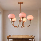 Curved Arm Opal Glass Mushroom Globe Pendant Light above a dining table