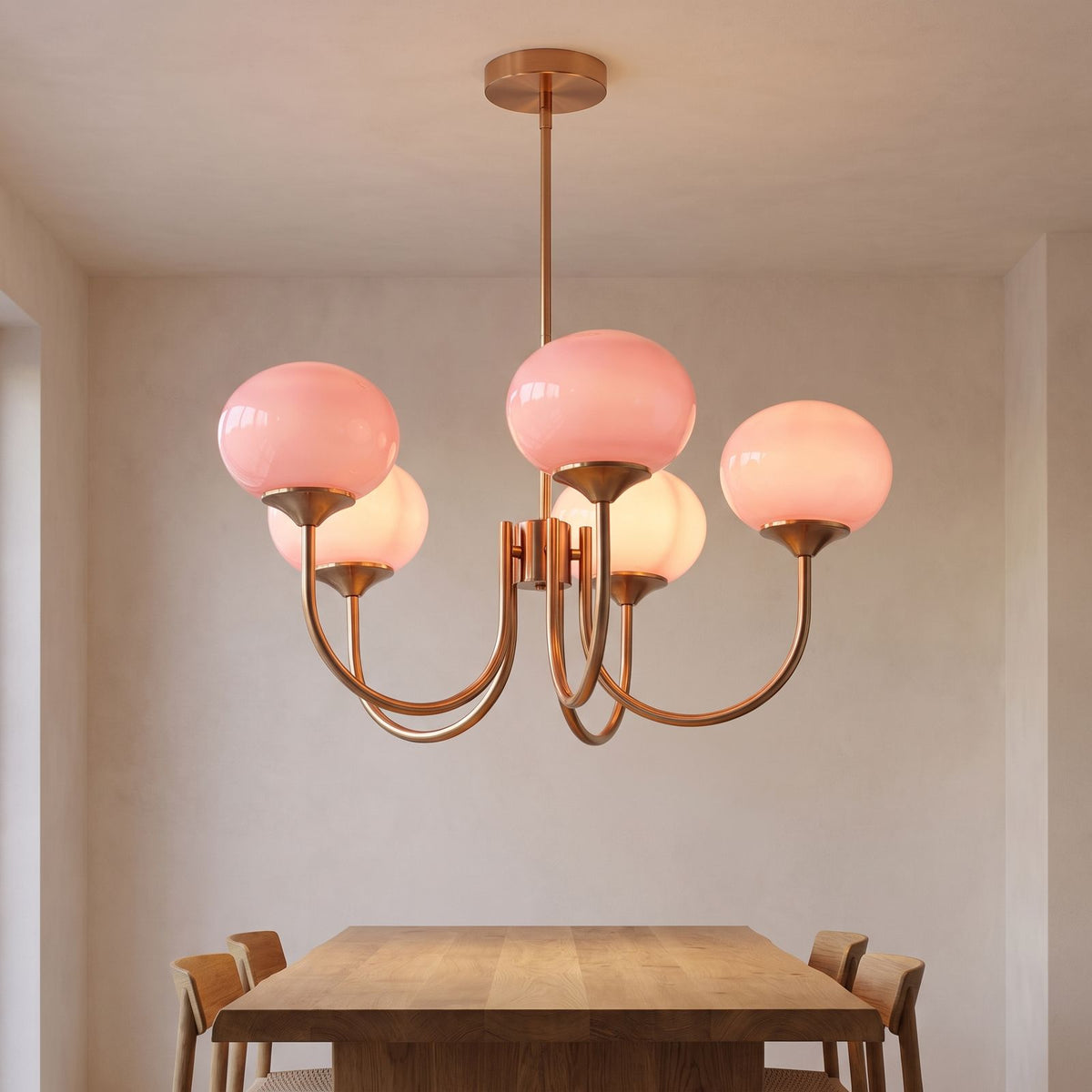 Curved Arm Opal Glass Mushroom Globe Pendant Light above a dining table