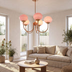 Curved arm opal glass globe chandelier in a living room in daylight