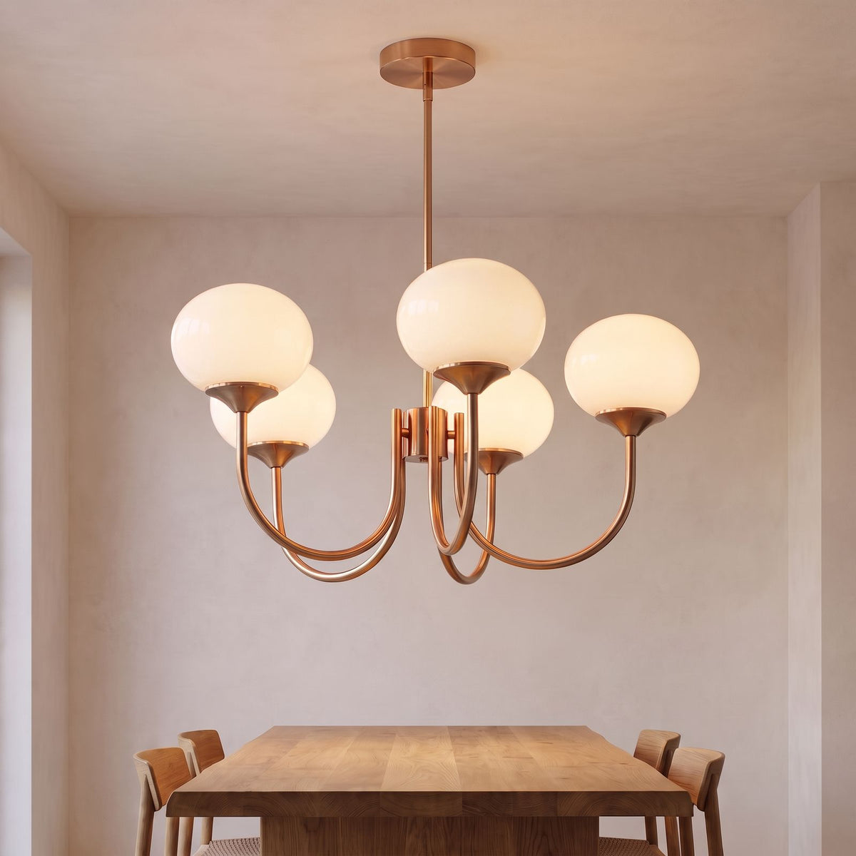 Curved Arm Opal Glass Mushroom Globe Pendant Light with white globes above a dining table