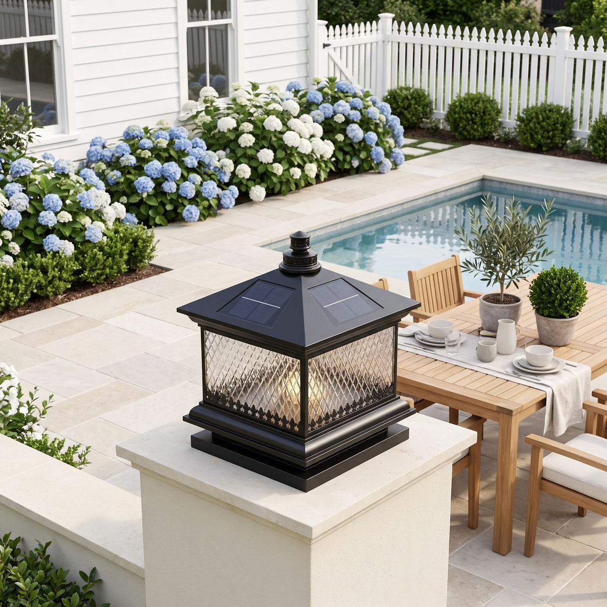 Diamond Pattern Glass Lantern Solar Post Light on a courtyard terrace pillar in daylight