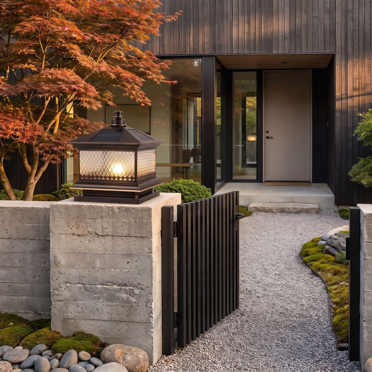Diamond Pattern Glass Lantern Solar Post Light in bronze on a sandstone gate pillar at dusk