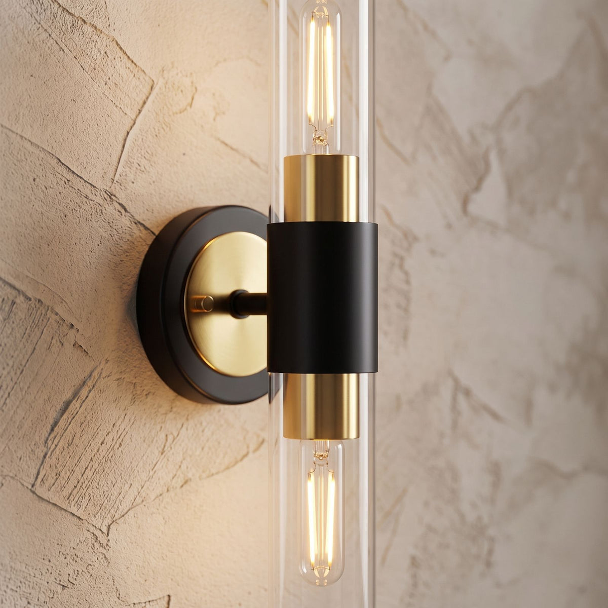 Double Bulb Clear Glass Tube Wall Light, close view at 45 degrees on a plaster wall