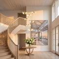Double Ceramic Trumpet Cluster Chandelier in a double-height entry foyer