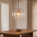 Double Glass Fluted Dome Pendant Light above a dining table