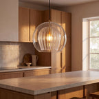 Double glass fluted dome pendant light over a kitchen island bench
