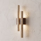 Double Travertine Column Wall Light, close view at 45 degrees on a plaster wall