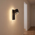 Backlit spotlight bedside wall light on a hallway wall