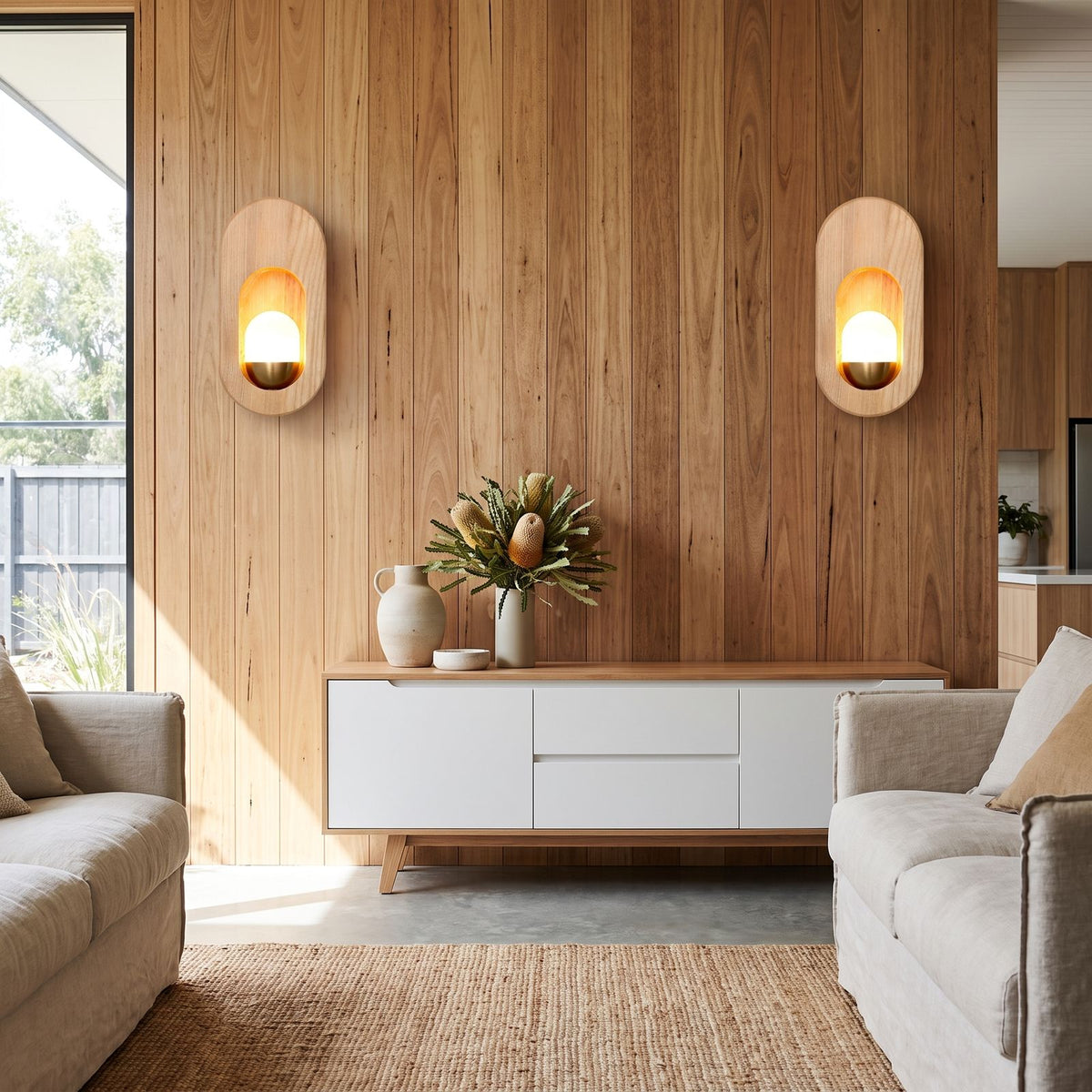 Egg-Shaped Wood and Acrylic Wall Light in a pair on a wall of an Australian home
