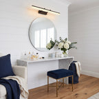 Extendable Dual Rod Stainless Steel LED Vanity Wall Light above the mirror of a dressing table