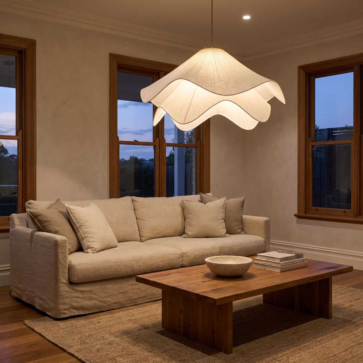 Fabric Petal Japandi Pendant Light above a linen sofa in a living room