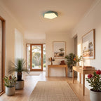 Faceted pentagon LED ceiling light on a living room ceiling in daylight