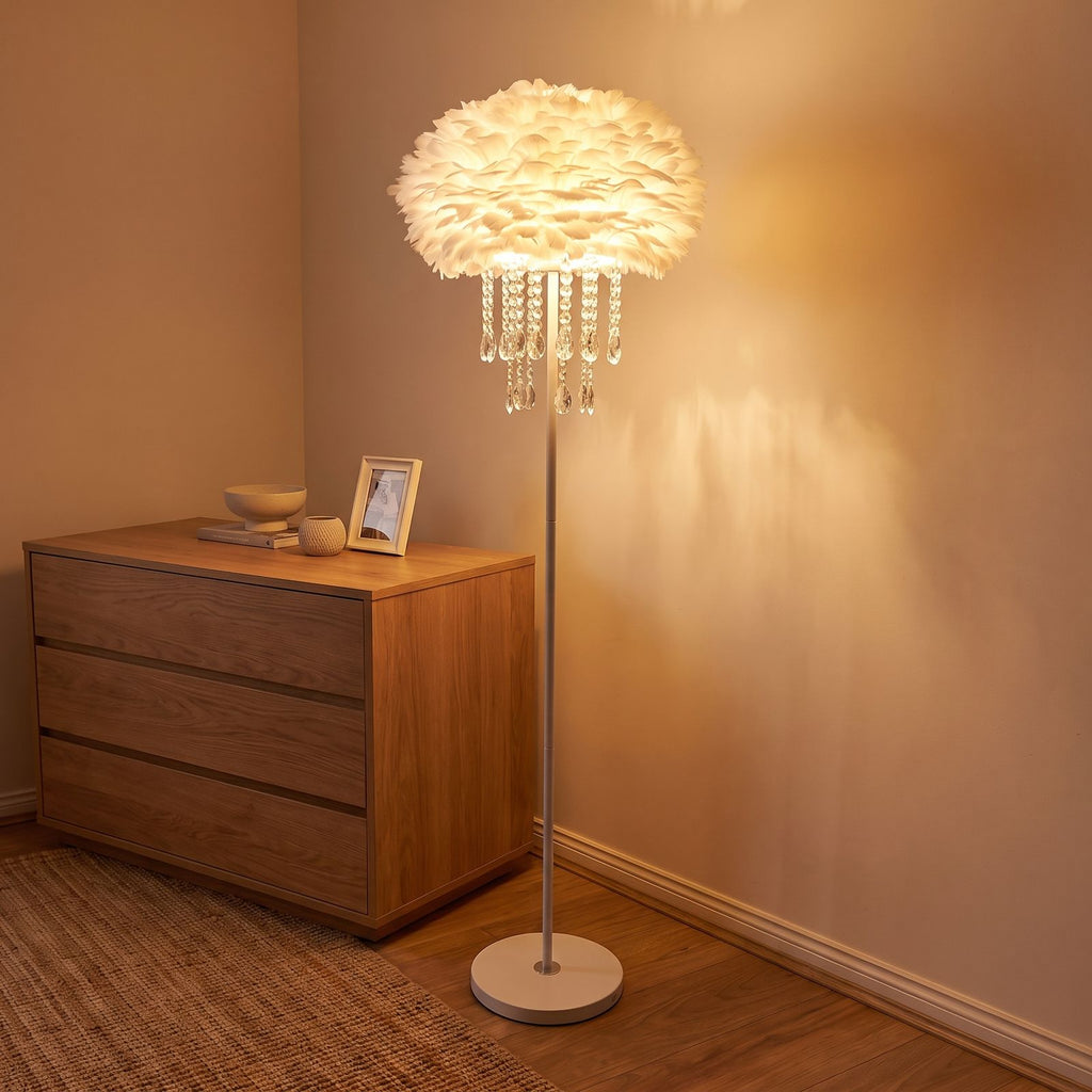 Feather shade crystal drop floor lamp in a bedroom corner beside a dresser