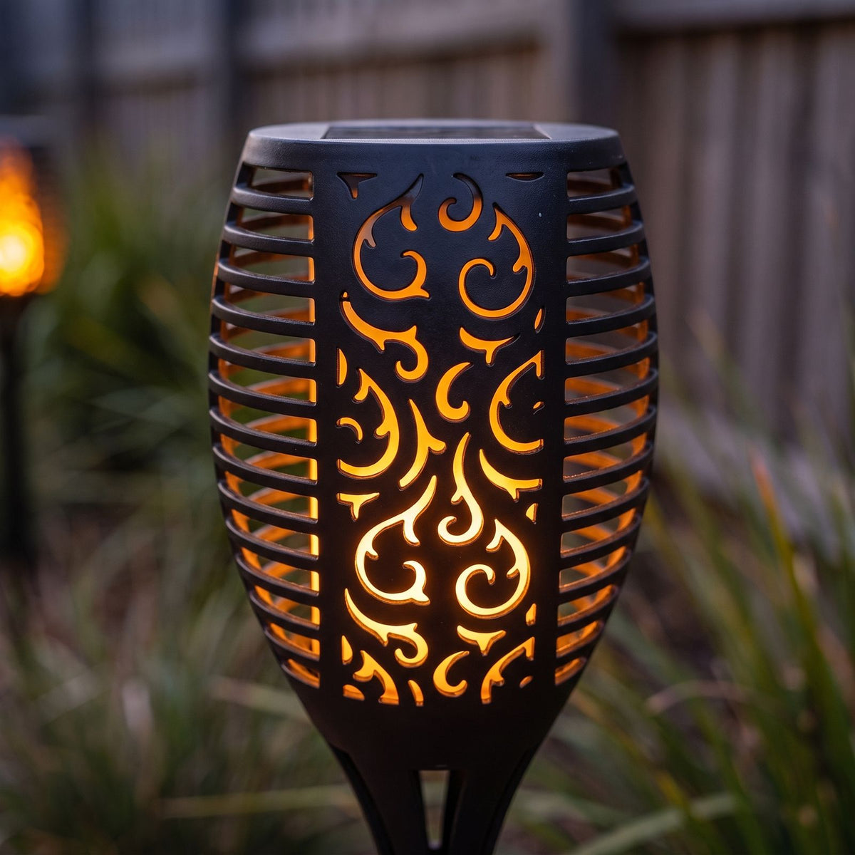 Close-up of the openwork torch head and flame effect light