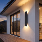 Flat bar up down outdoor wall light on a covered alfresco patio wall