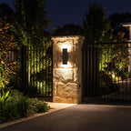 Flat Bar Aluminium Up Down Outdoor Wall Light in black on a sandstone gate pillar at night
