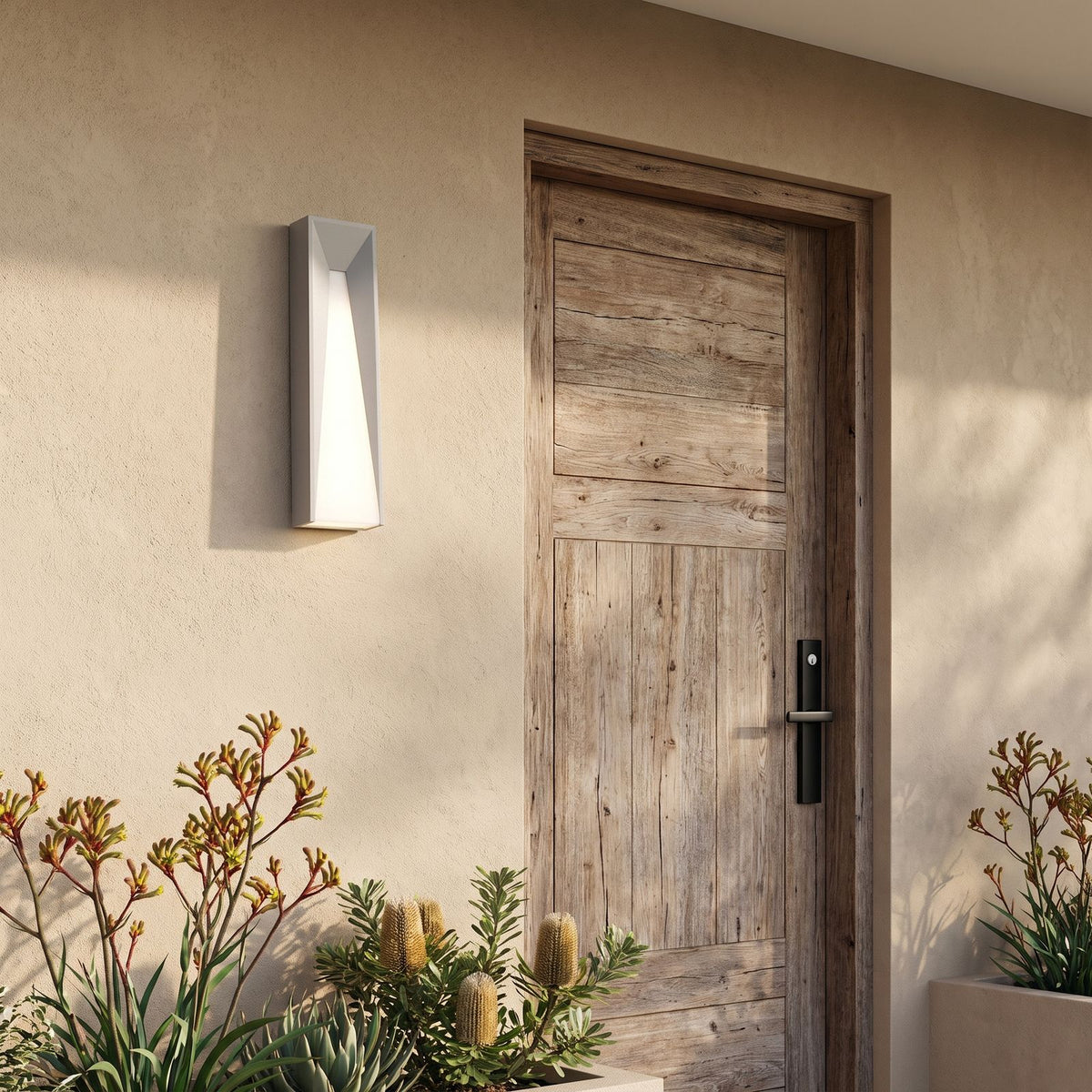 Geometric Layered Metal Outdoor Wall Light beside a timber front door