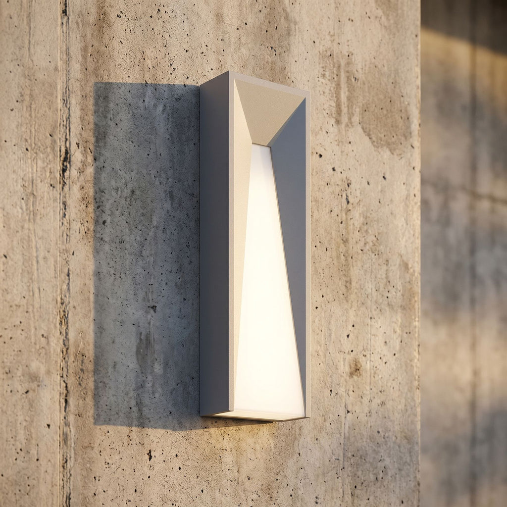 Geometric Layered Metal Outdoor Wall Light, close view at 45 degrees on a stone wall