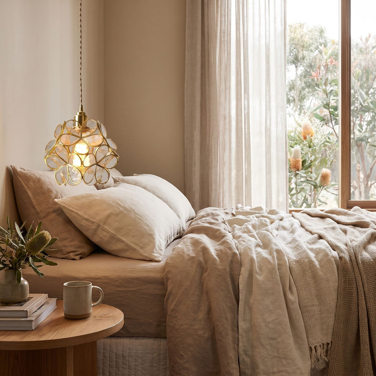Glass Blossom Cluster Pendant Light beside a bed as a bedside pendant