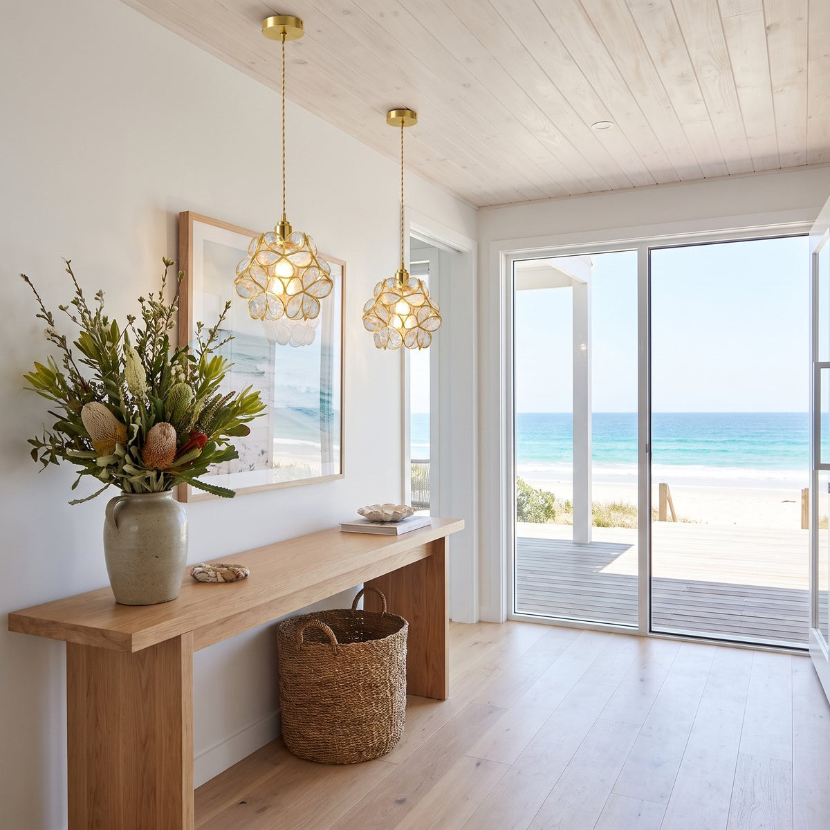 Glass Blossom Cluster Pendant Light, a pair above a console in a coastal entry
