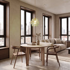 Glass Blossom Cluster Pendant Light in green glass above a round table in an apartment