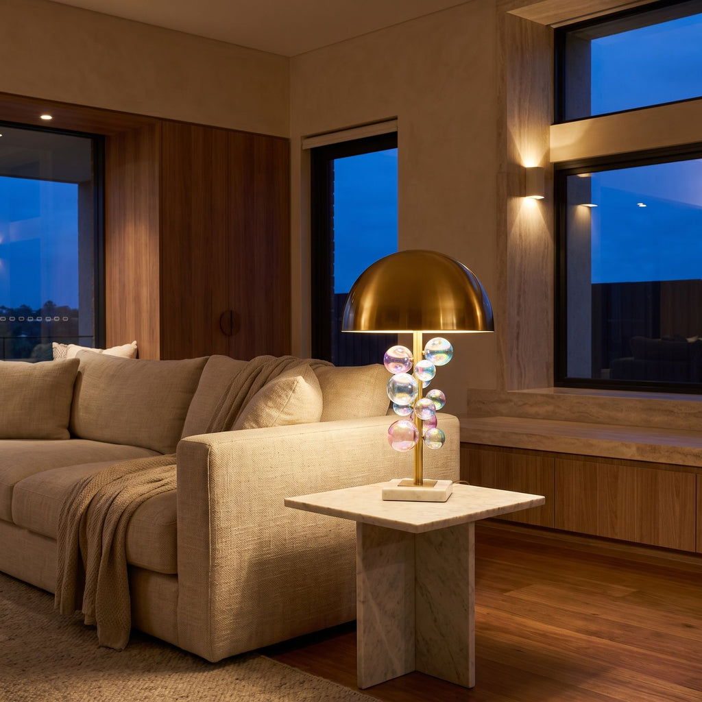 Glass Orb Cluster Marble Table Lamp on a side table beside a sofa