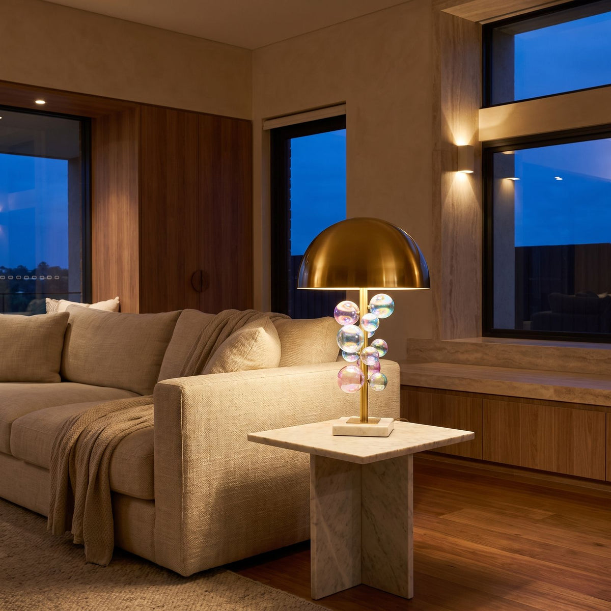 Glass Orb Cluster Marble Table Lamp on a side table beside a sofa