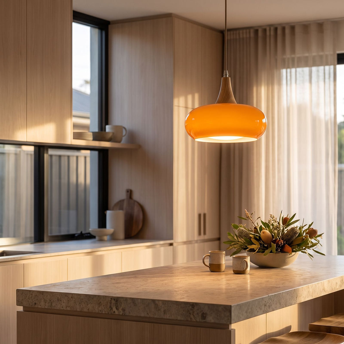 Glass Saucer Shade and Timber Pendant Light lighting a second setting in an Australian home