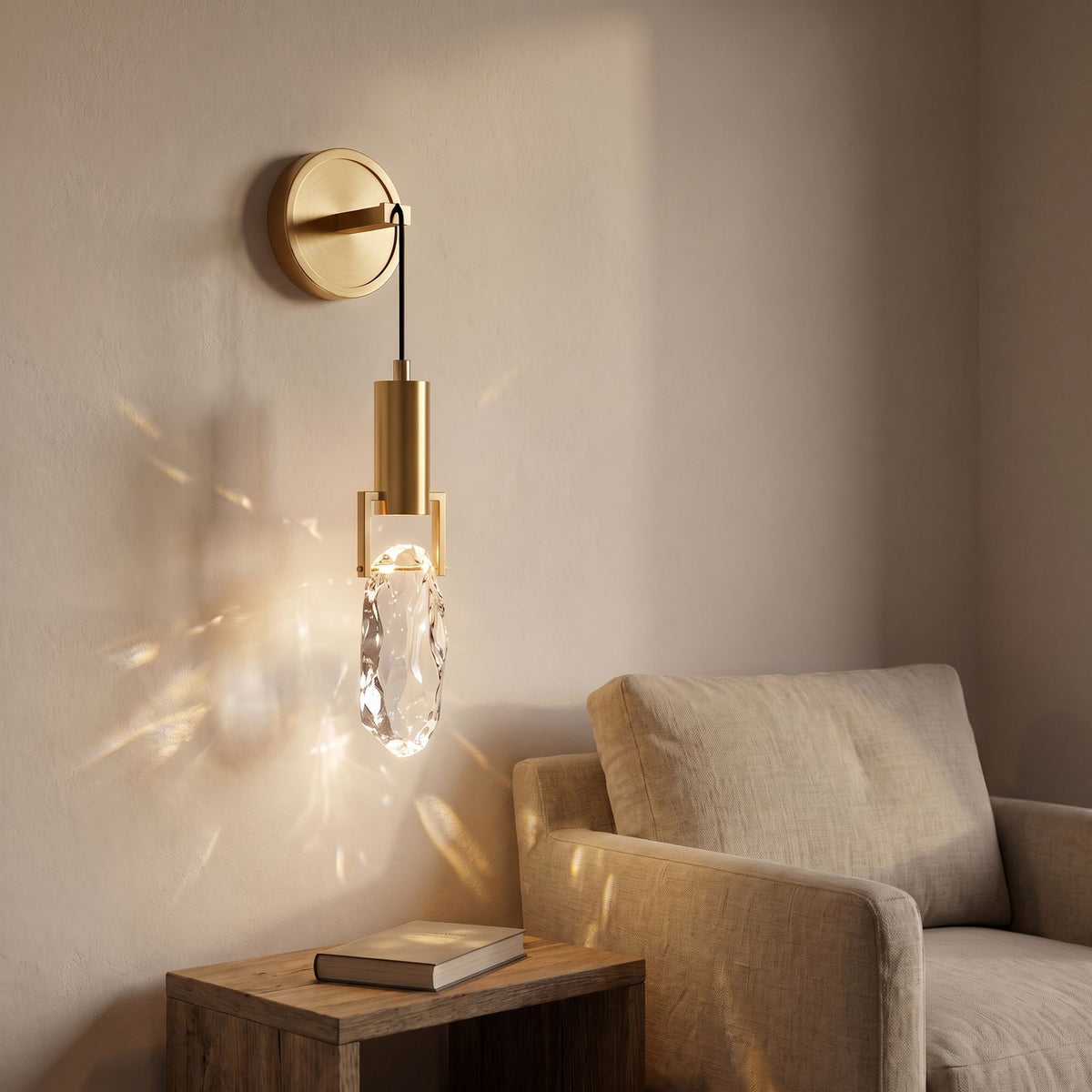 Gold hook hanging glass rock wall light above an armchair in a reading corner