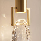 Close-up of the gold holder and faceted glass rock