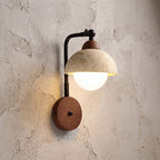 Gooseneck Travertine Dome and Globe Wall Light, close view at 45 degrees on a plaster wall