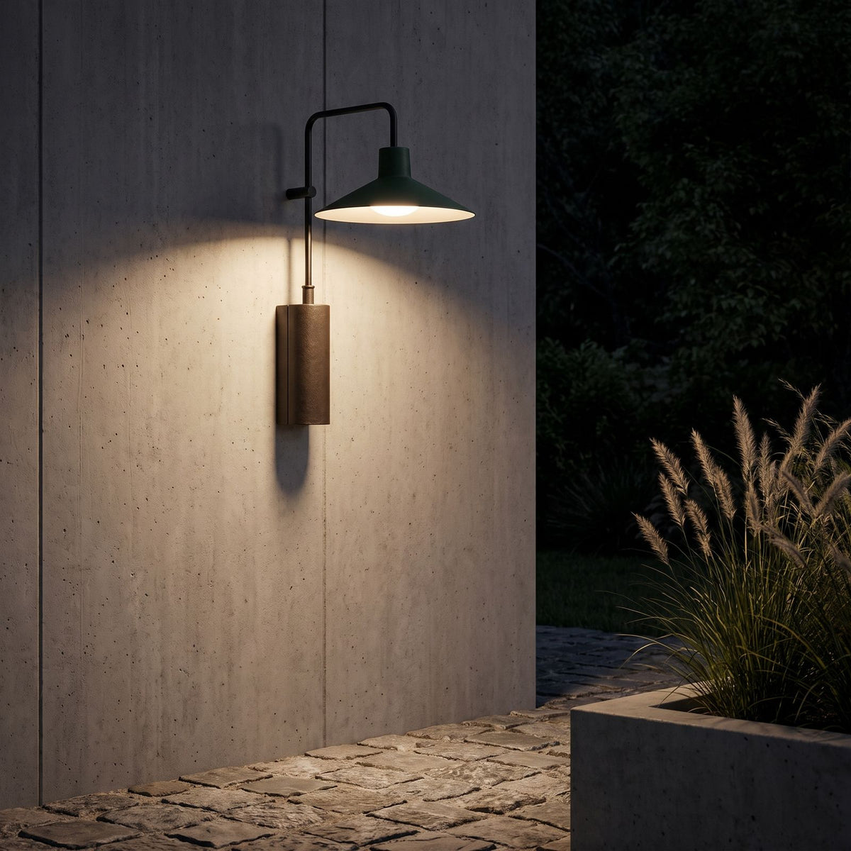 Green Cone Shade Outdoor Wall Light lighting a concrete wall at night