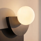 Close-up of the half-moon plate and opal globe