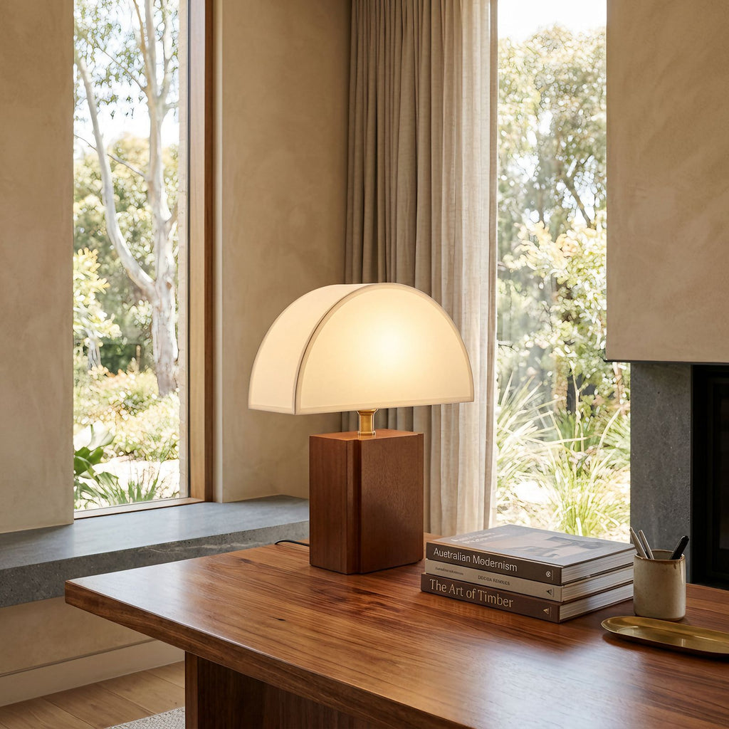Half Moon Shade Bamboo Base Table Lamp on a study desk