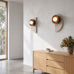 Half Moon Travertine and Wood Wall Light in a pair on a wall of an Australian home