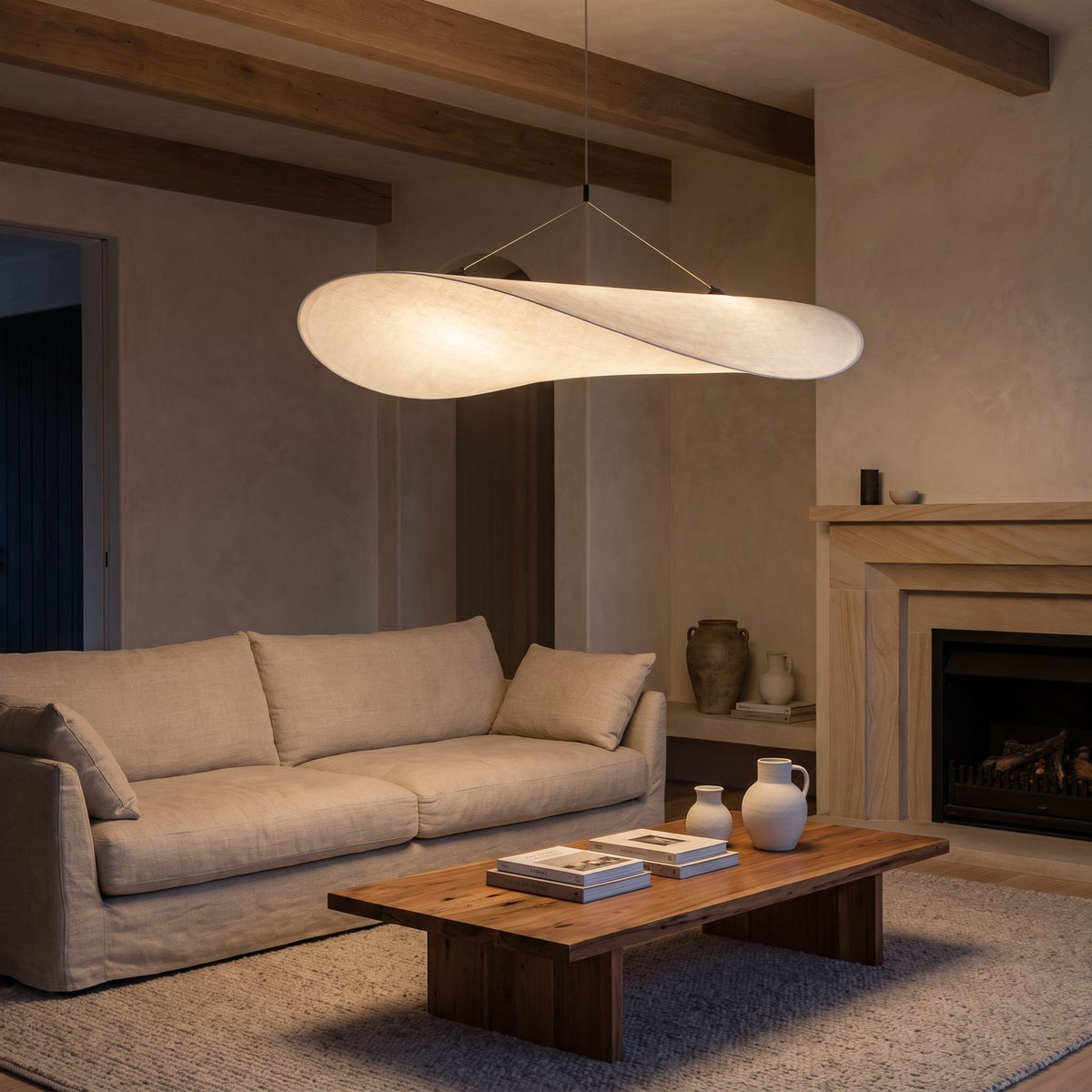 Hand-Knitted Silk Fabric Pendant Light above a linen sofa in a living room