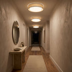 Hand-Woven Acrylic Drum Shade Ceiling Lights along a hallway ceiling