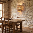 Hand Woven Natural Fibre Up Down Wall Light on a dining room wall