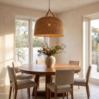 Handwoven Rattan Japandi Pendant Light above a round table in a breakfast nook