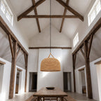 Handwoven Rattan Japandi Pendant Light, Ø55 cm, under a vaulted timber-beam ceiling