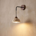 Hanging Travertine Shade LED Wall Light, close view at 45 degrees on a plaster wall