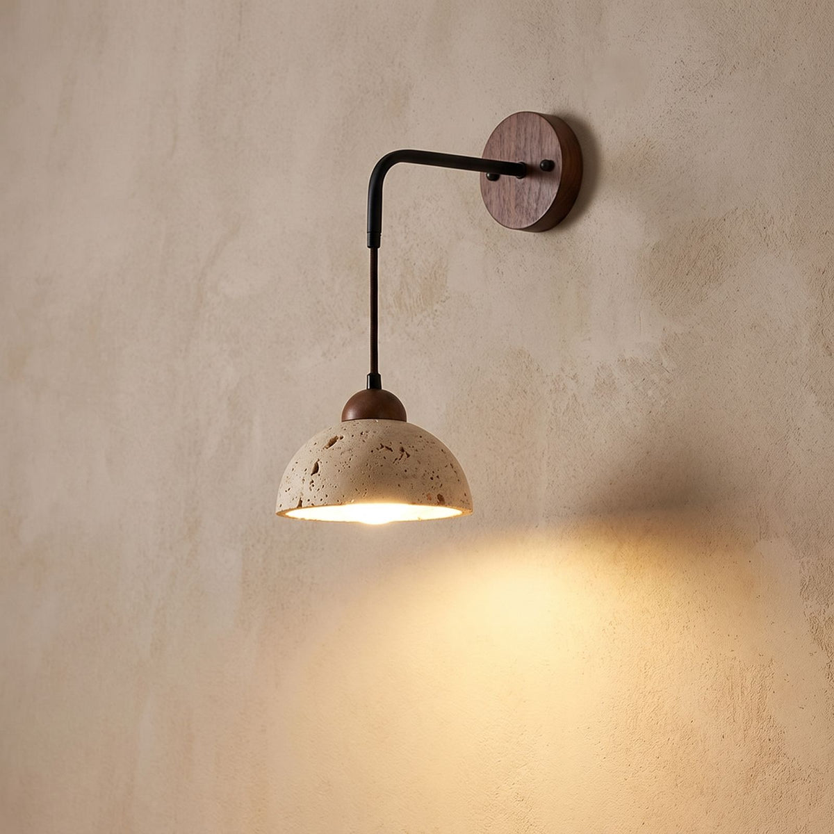 Hanging Travertine Shade LED Wall Light, close view at 45 degrees on a plaster wall