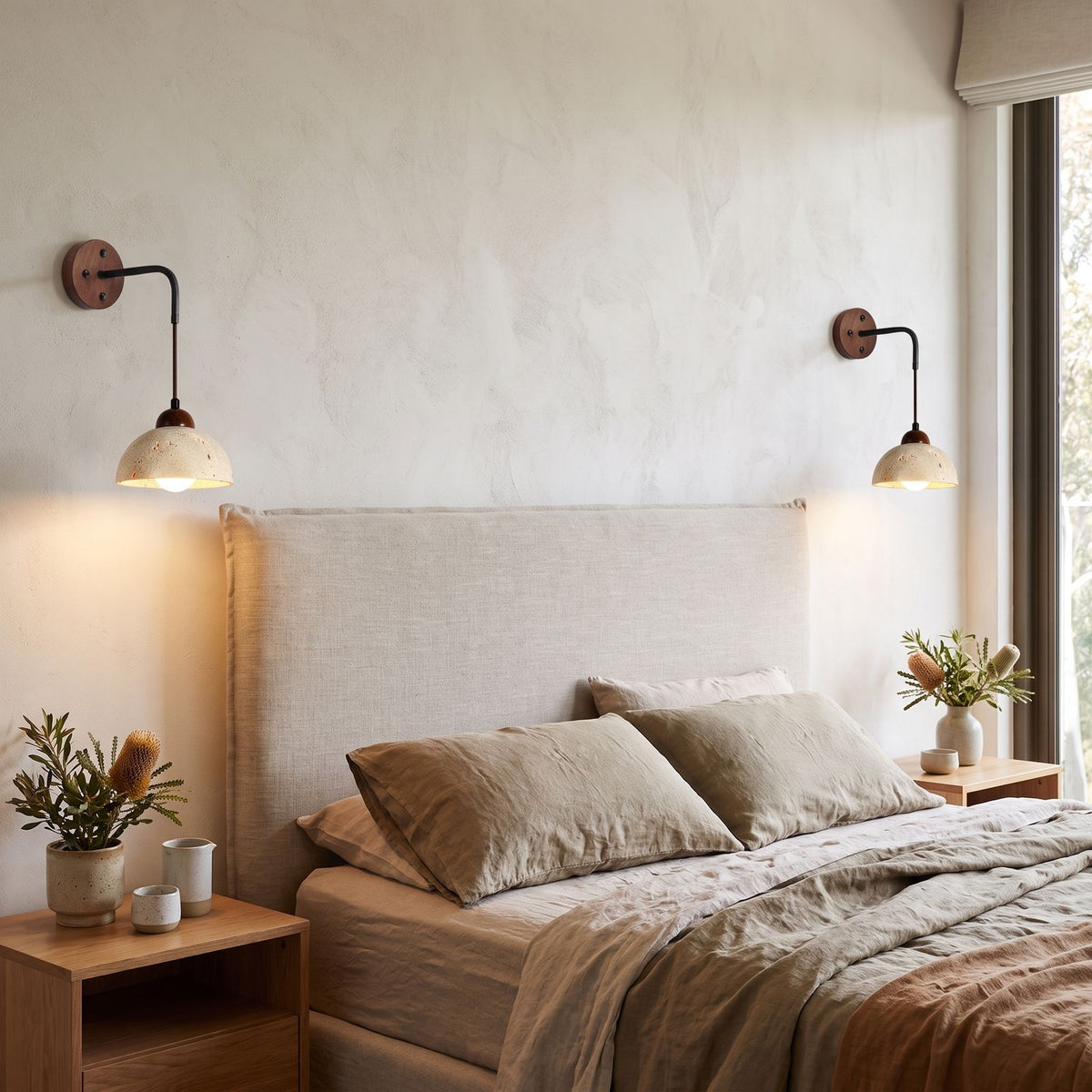 Hanging Travertine Shade LED Wall Light in a pair on a wall of an Australian home